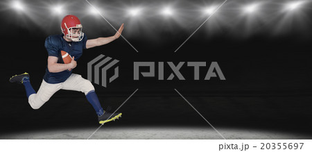 Composite image of american football player jumping with the ball Composite image of american football player jumping with the ball 20355697