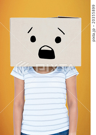 Composite image of depressed woman with box over head Composite image of depressed woman with box over head 20355899