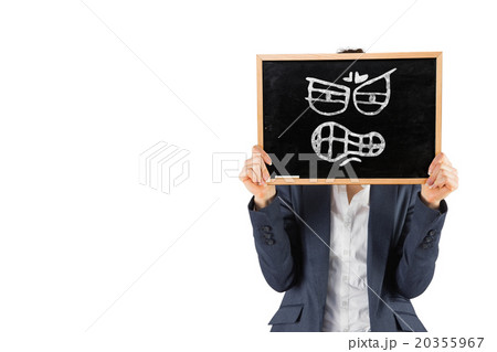 Composite image of businesswoman showing board 20355967