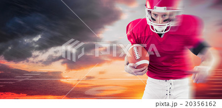 Composite image of portrait of focused american football player 20356162