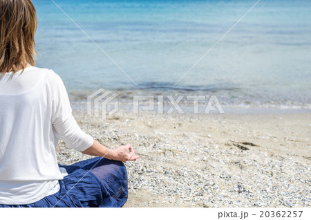 Woman meditating at the sea 20362257