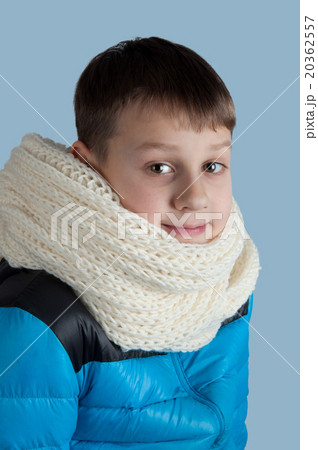 Cute boy in jacket and scarf Cute boy in jacket and scarf 20362557