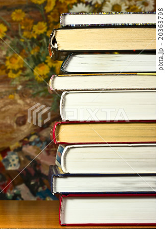 A stack of books on a table A stack of books on a table 20363798