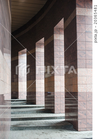 Square columns in a modern building lined 20365481