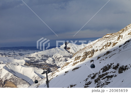 Gondola lift on ski resort at sun evening Gondola lift on ski resort at sun evening 20365659