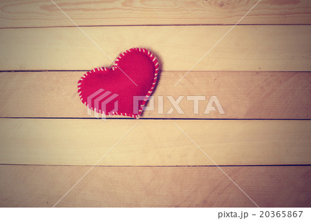Textile red heart on a wooden texture Textile red heart on a wooden texture 20365867