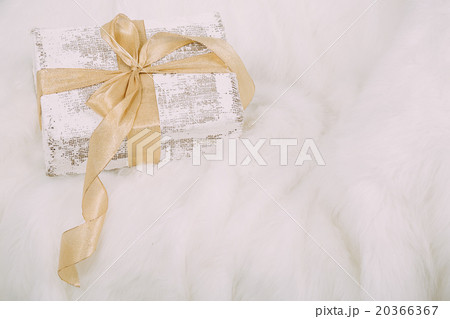 Shabby chic gift with ribbon on white background Shabby chic gift with ribbon on white background 20366367