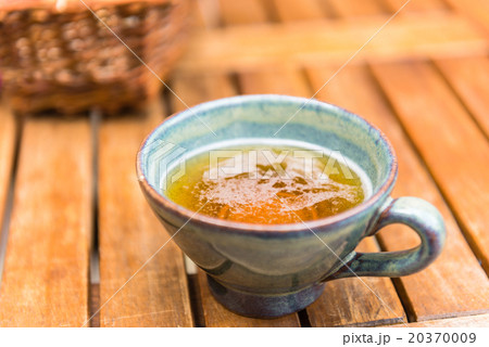 Norman apple cider in a typical ceramic cup Norman apple cider in a typical ceramic cup 20370009