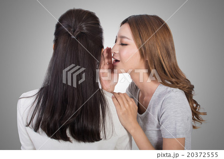 Asian friends whisper 20372555