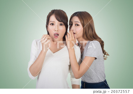 Asian friends whisper Asian friends whisper 20372557