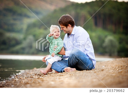 Father and son by the lake Father and son by the lake 20379662