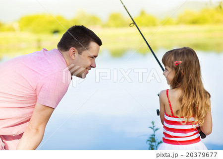 Happy father and daughter fishing Happy father and daughter fishing 20379677
