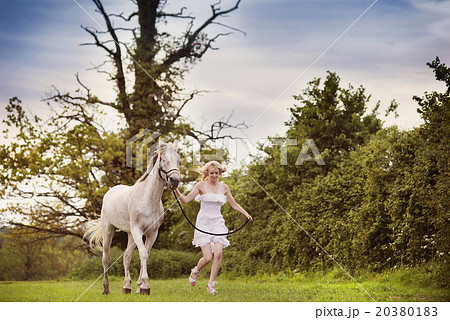 Woman with horse 20380183