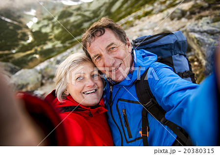 Senior couple hiking Senior couple hiking 20380315
