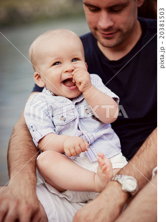 Father and son by the lake 20381503