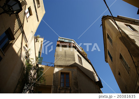 Narrow steets and historic buildings in Taormina 20381635