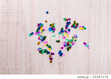 Colorful confetti on wood background Colorful confetti on wood background 20387178