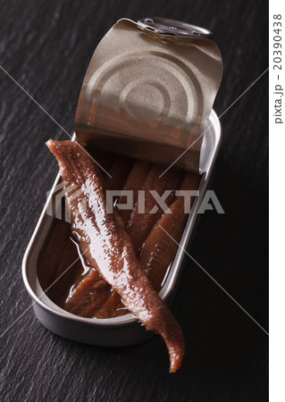Canned anchovy fillets closeup on a slate board 20390438