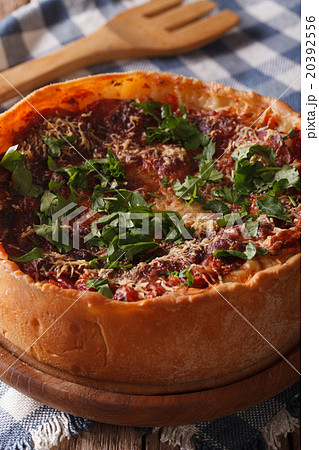 Homemade Chicago deep dish pizza closeup. Vertical 20392556