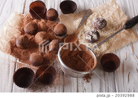 sprinkling chocolate truffles cocoa powder and nut sprinkling chocolate truffles cocoa powder and nut 20392988