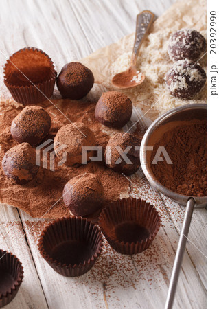 sprinkling chocolate truffles cocoa powder and nut sprinkling chocolate truffles cocoa powder and nut 20392990