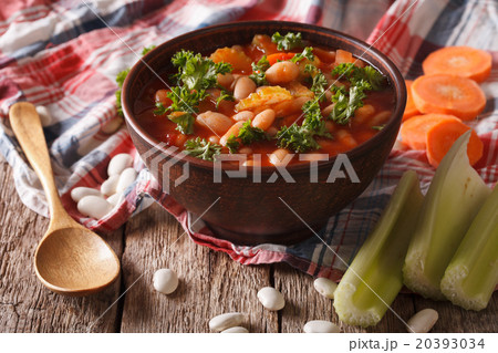 soup with beans, carrots and celery close-up soup with beans, carrots and celery close-up 20393034