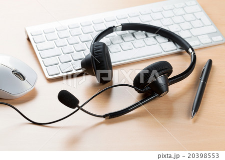Office desk with headset. Call center Office desk with headset. Call center 20398553