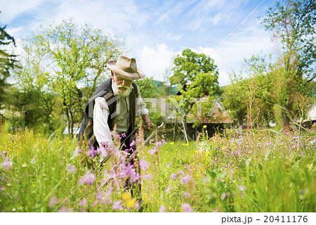 Man with scythe Man with scythe 20411176