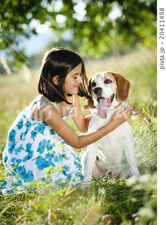 Little girl with dog Little girl with dog 20411498