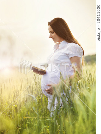 Pregnant woman praying Pregnant woman praying 20411600