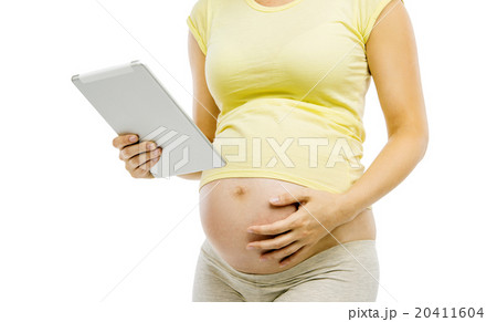 Unrecognizable pregnant woman isolated on white Unrecognizable pregnant woman isolated on white 20411604