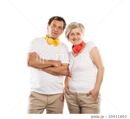 Senior couple with headphones Senior couple with headphones 20411803