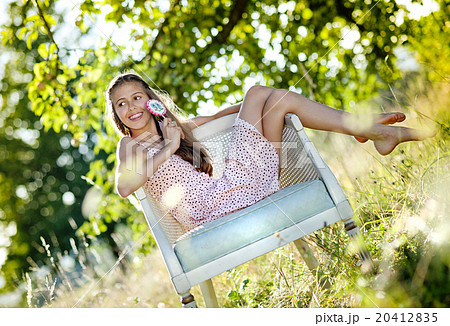 Teenage girl in park 20412835