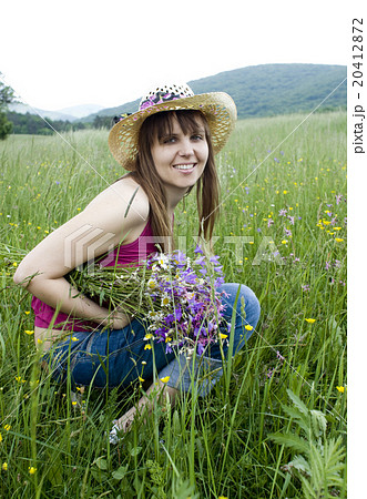 Woman in field Woman in field 20412872