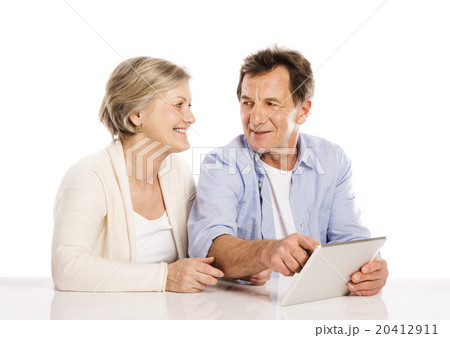Senior couple with tablet Senior couple with tablet 20412911