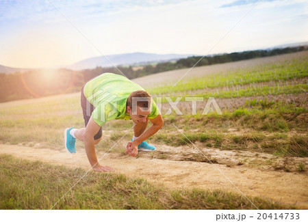 Male runner tripping over 20414733