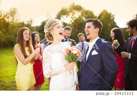 Newlyweds at wedding reception 20415313