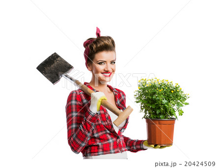 Pin-up girl holding flower pot with yellow daisies Pin-up girl holding flower pot with yellow daisies 20424509