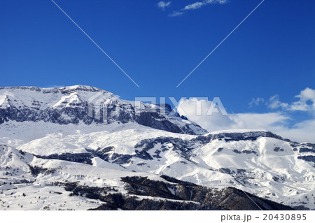Snowy mountains at nice sun day 20430895