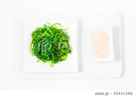 Beautiful white plate with Wasabi on white  20431366