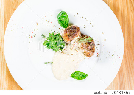 Beautiful juicy grilled meat with garnish 20431367