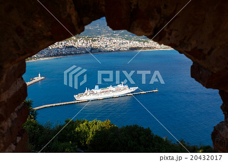 Cruise ship through hole of old Castle in Alanya 20432017
