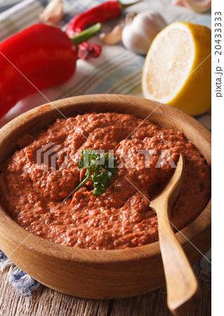 Muhammara - appetizer of peppers and nuts close-up Muhammara - appetizer of peppers and nuts close-up 20433333