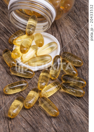 Tablets fish oil. Omega vitamins. Tablets fish oil. Omega vitamins. 20433532