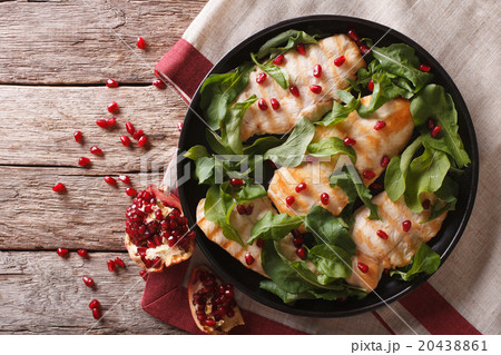 Chicken salad with arugula and pomegranate Chicken salad with arugula and pomegranate 20438861