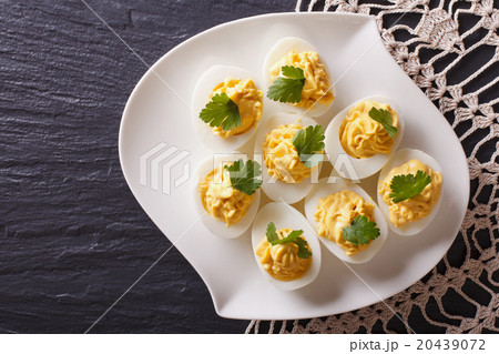 Stuffed eggs with mustard and parsley 20439072