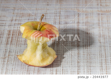 Apple core on a wooden table. With Shadow. Apple core on a wooden table. With Shadow. 20443977