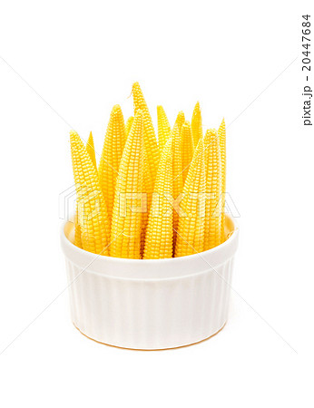 Baby corn in a cup isolated on white background 20447684