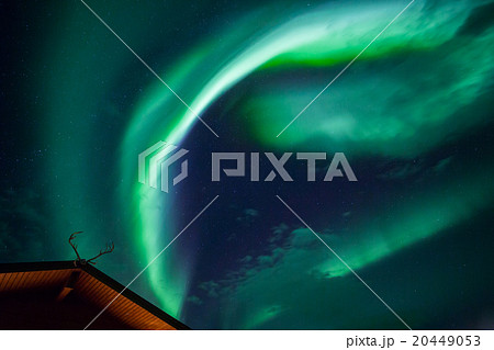 Aurora borealis above a cabin Aurora borealis above a cabin 20449053