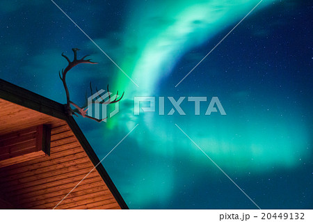 Aurora borealis above a cabin 20449132
